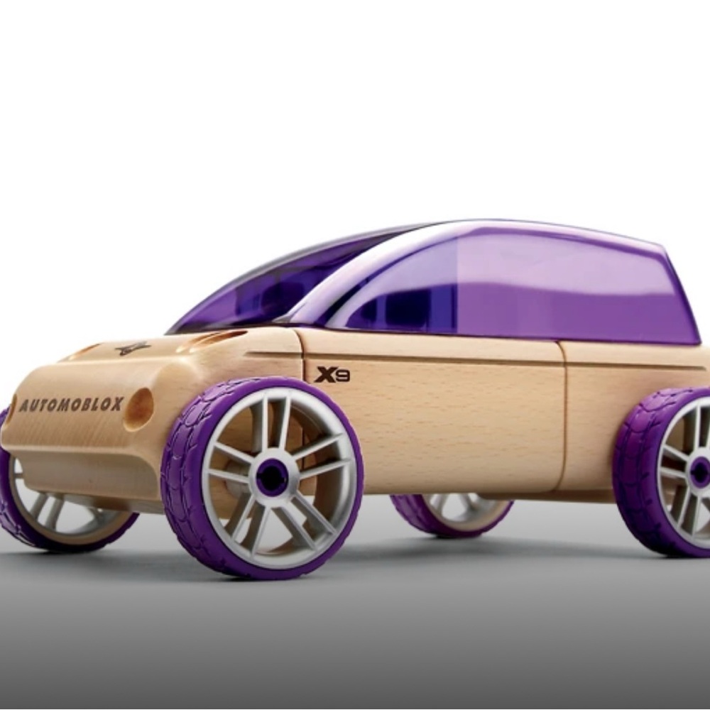 New in box - hard to find X9 Sport Utility Purple Automoblox